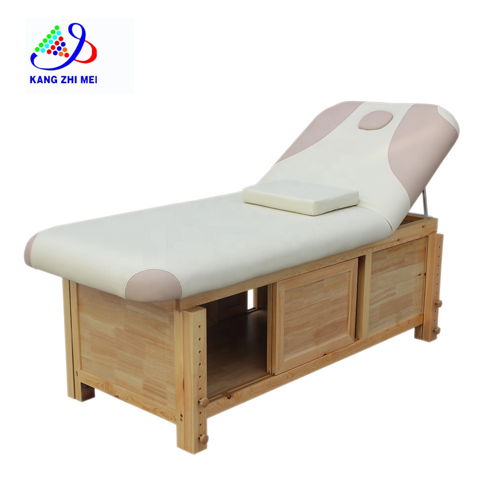 Mesa de tratamiento de terapia de masaje tailandés Cama facial de spa con almacenamiento